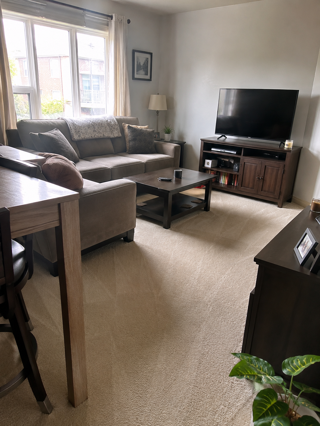 Freshly cleaned living room in a Montreal apartment after a regular cleaning visit